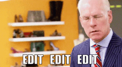a man in a suit looking discombobulated with the words EDIT EDIT EDIT