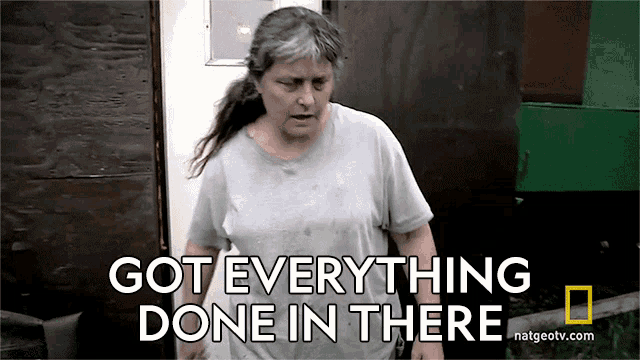 a woman walking away from a building with the caption "got everything done in there"