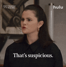 Selena Gomez saying, "That's suspicious."