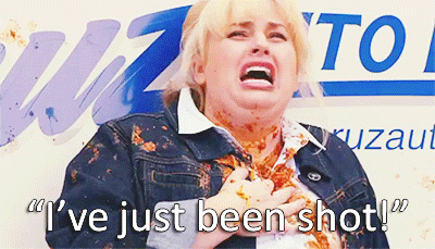A white woman with blonde hair and covered in a splattered burrito saying, "I've just been shot."