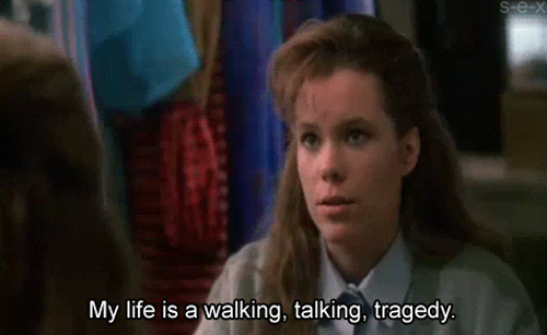 A white girl with brown hair and the text, "My life is a walking, talking, tragedy."