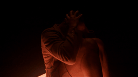 person dances on lightbox