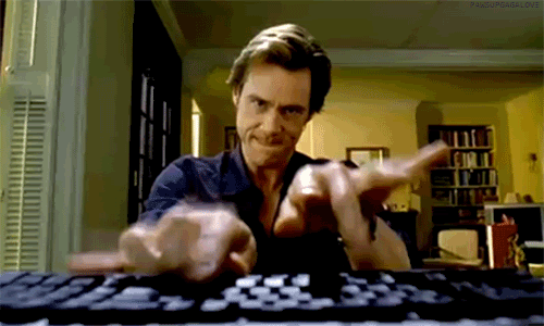 Jim Carrey typing in Bruce Almighty