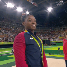 Simone Biles waves hi