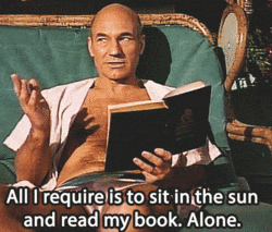 Jean-Luc Picard sitting on a couch saying »All I require is to sit in the sun and read my book. Alone.«