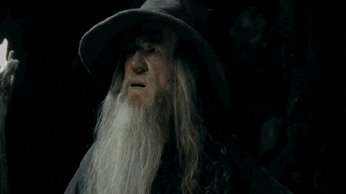 Zooming in on the face of white-haired wizard saying, "I have no memory of this place."