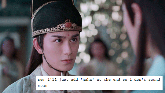 gif of Jin Guangyao talking to Lan Xichen from the C-Drama THE UNTAMED. text on the gif jokes that he is saying "i'll just add 'haha' at the end so i don't sound mean"