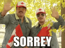 two men waving canadian flags saying SORREY
