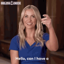 A person in a blue shirt snaps her fingers and says, "Hello, can I have a glass of champagne?"