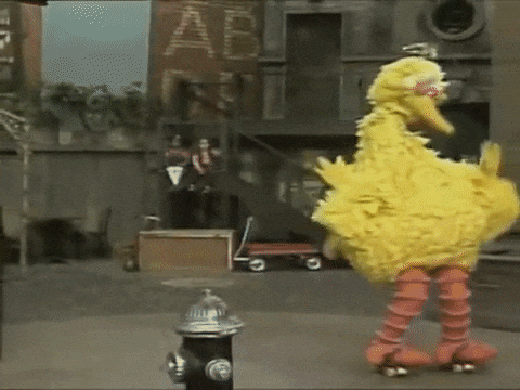 Big Bird casually skating off stage